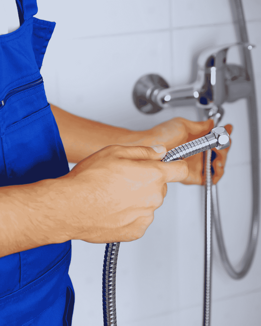 Plumber checking a shower valve in a coastal Delray Beach home