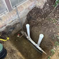 Plumber tightening a sink drain pipe during a same-day plumbing repair in Lantana FL